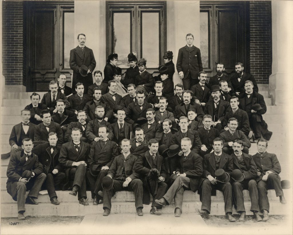 Mary Graham sits in the top row amidst her Class of 1880 peers.